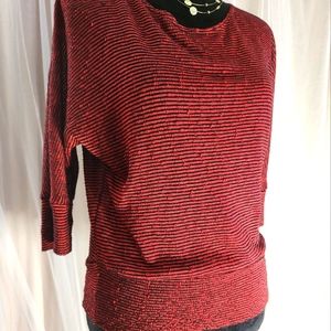 BY & BY 3/4 sleeve pullover red & black textured shirt in good worn condition.